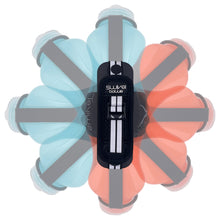 Load image into Gallery viewer, The Classic Swivel Bottle shown from above, demonstrating its swivel mechanism with two different colored flasks (blue and orange) rotating around the central handle.