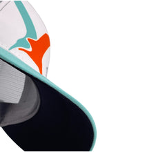 Load image into Gallery viewer, Close-up, below view of the Swivel Bottle Technical Trucker hat, zoomed-in on the Swivel Bottle brand logo