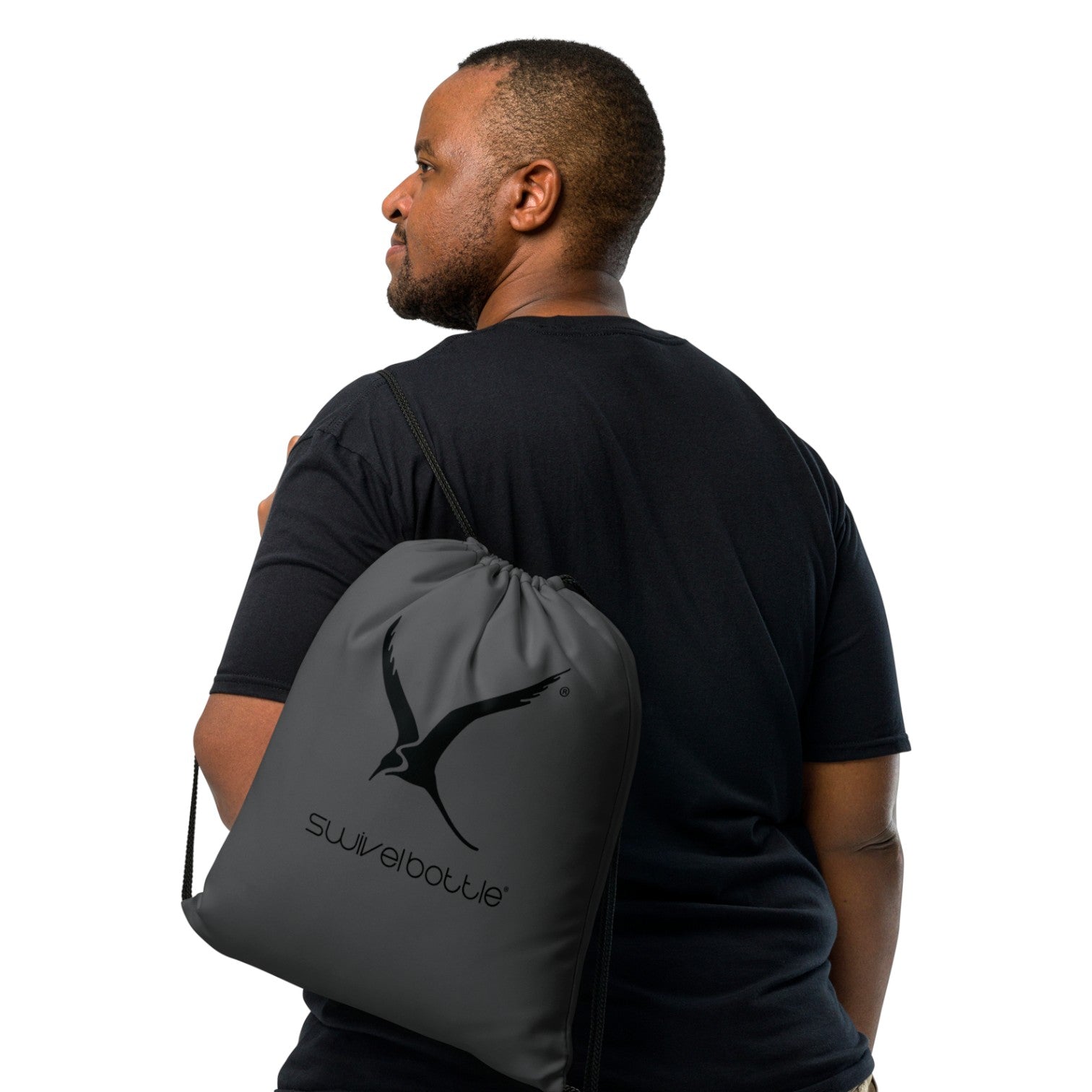 Man wearing a black drawstring bag with 'SwivelBottle' logo on a white background